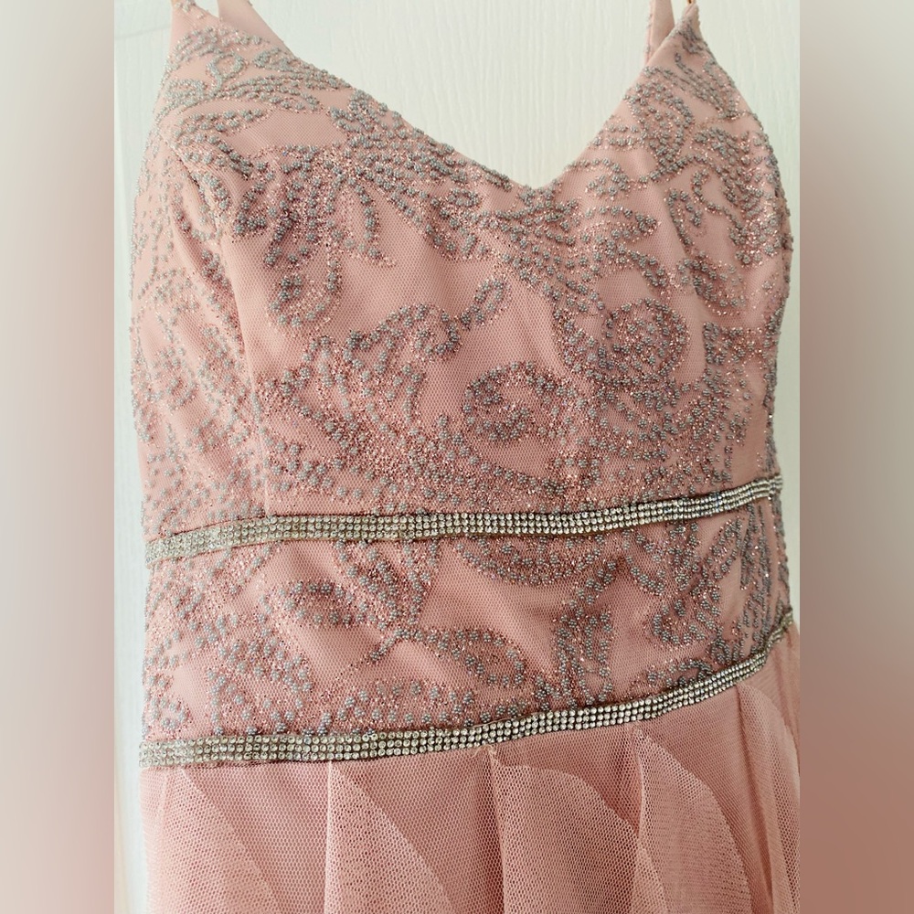 Stunning and super fun, hi-low, ruffle dress with rhinestone trim. - Picture 4 of 5
